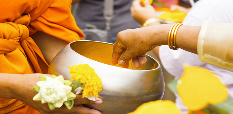 14657877649655_Laos_14641642462497_giving_alms.jpg